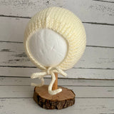 Hand knitted bonnet - cream