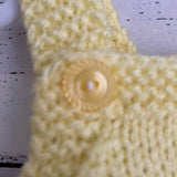 Hand knitted baby romper - lemon