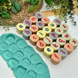 Lowercase alphabet stamping stones