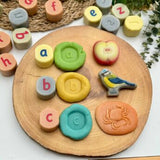 Lowercase alphabet stamping stones