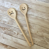 Sad face wooden spoon