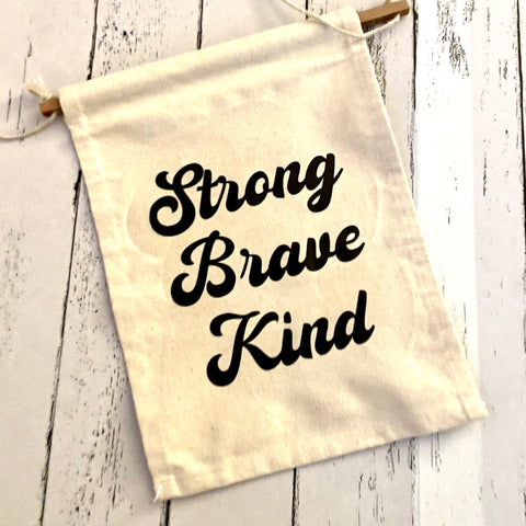 Strong, brave, kind canvas wall hanging