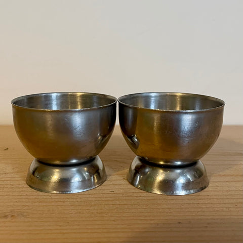 Pair of stainless steel eggcups with a hole in the base (preloved)