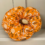 Handmade cotton pumpkin - bright orange background with black and white leaf design