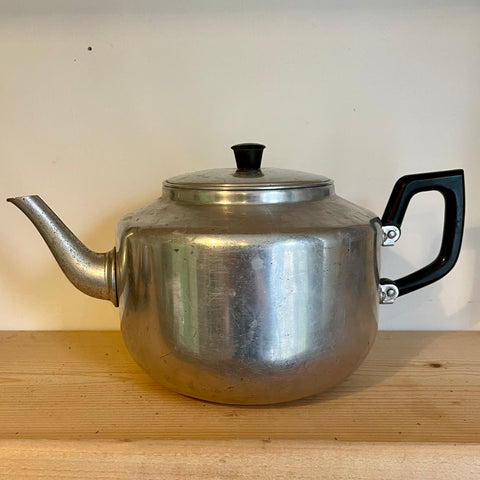 Stainless steel teapot with black plastic handles (preloved)