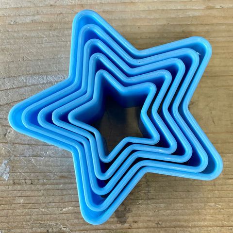 Blue plastic star shaped cutters (preloved)