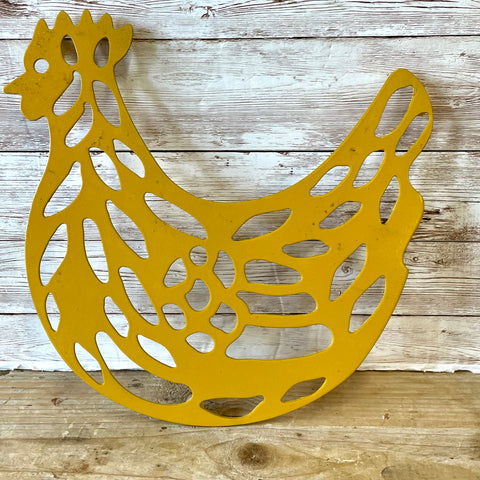Mustard metal hen shaped trivet (preloved)