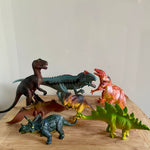 Set of 7 dinosaurs including stegosaurus (preloved)