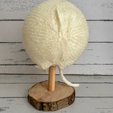 Hand knitted bonnet - cream