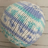 Blue and white patterned beanie hat