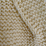 Hand knitted baby romper - cream