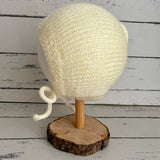 Hand knitted bonnet - cream