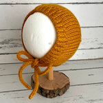Hand knitted bonnet - mustard