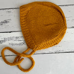 Hand knitted bonnet - mustard