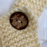 Hand knitted baby romper - cream