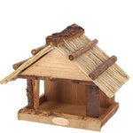 Bird table with thatched roof