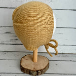 Hand knitted bonnet - caramel