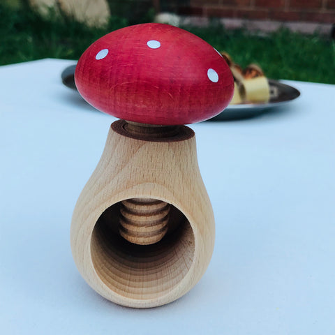 Red and white polka dot wooden mushroom